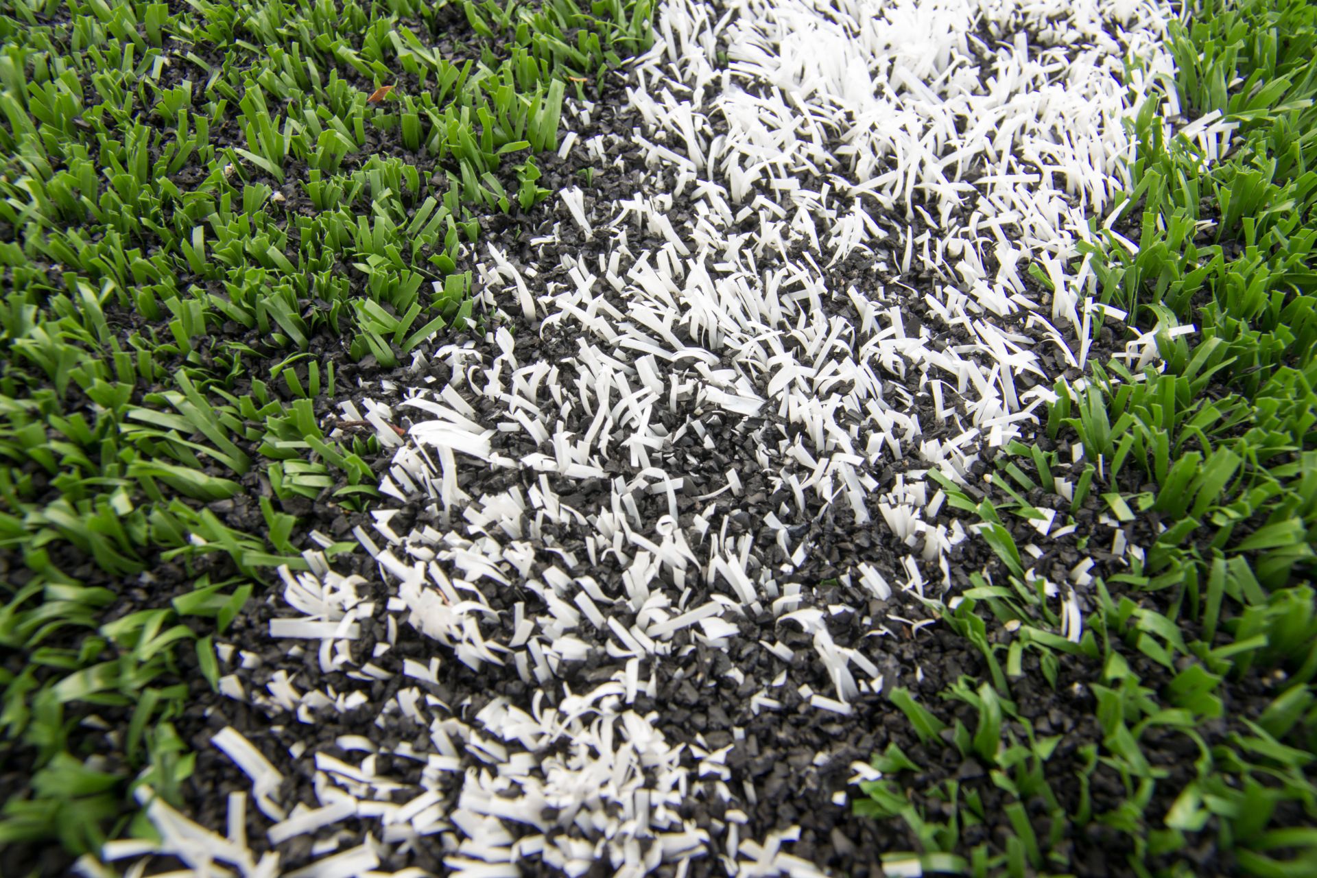 Black Pellets in Artificial Turf.